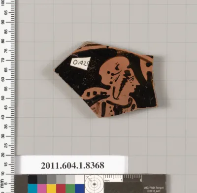 Terracotta fragment of a kylix (drinking cup)