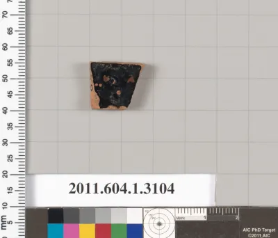 Terracotta fragment of a kylix (drinking cup)