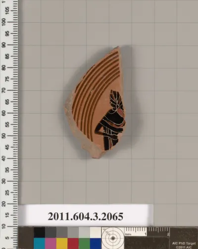 Terracotta fragment of a kylix (drinking cup)