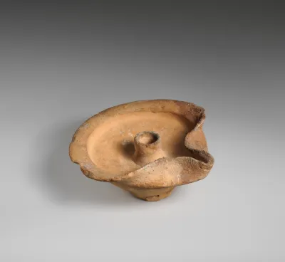 Terracotta saucer-shaped lamp