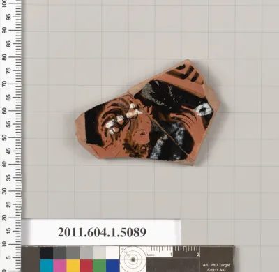 Terracotta fragment of a kylix (drinking cup)