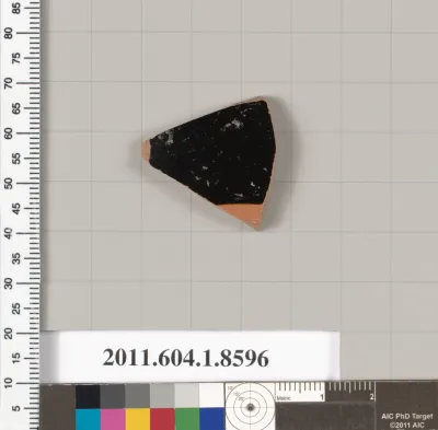 Terracotta fragment of a stemless kylix (drinking cup)