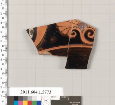 Terracotta fragment of a kylix: eye-cup  (drinking cup)