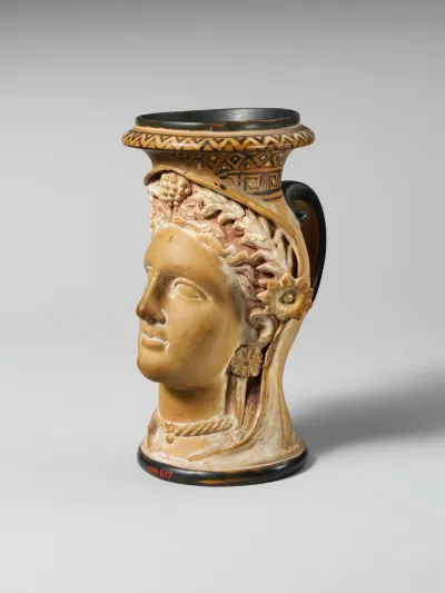 Terracotta oinochoe (jug) in the form of a woman's head