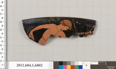 Terracotta rim fragment of a kylix (drinking cup)