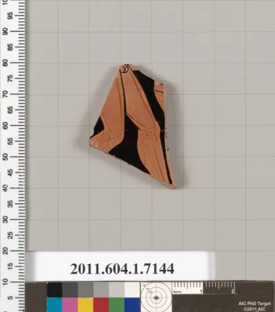 Terracotta fragment of a kylix (drinking cup)