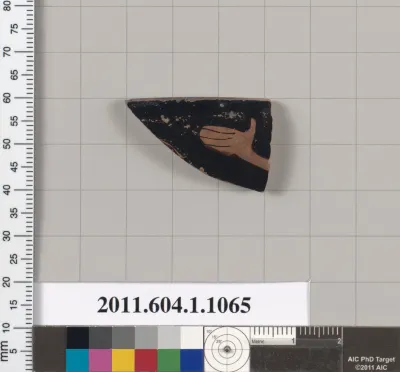 Terracotta rim fragment of a kylix (drinking cup)