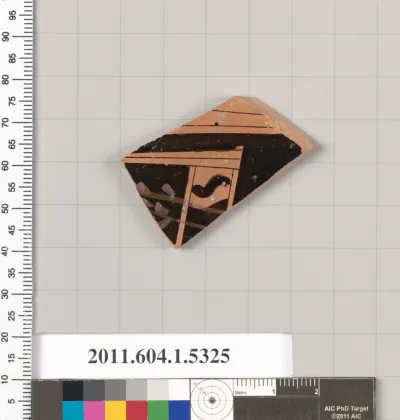 Terracotta fragment of a kylix (drinking cup)