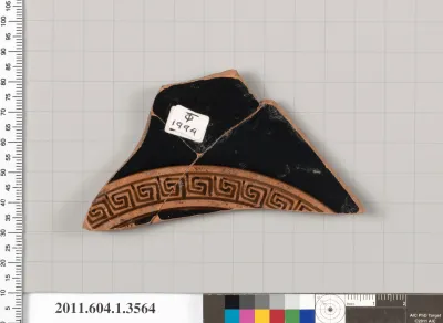 Terracotta fragment of a kylix (drinking cup)