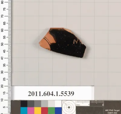 Terracotta rim fragment of a kylix (drinking cup)