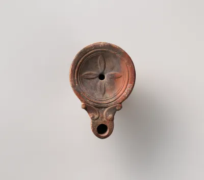 Terracotta oil lamp