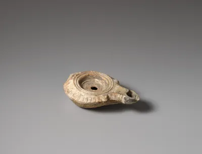 Terracotta oil lamp