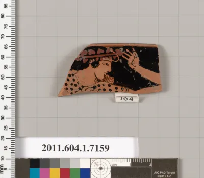 Terracotta rim fragment of a kylix (drinking cup)