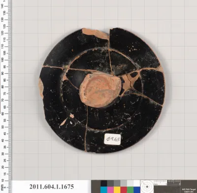 Terracotta fragment of a kylix (drinking cup)