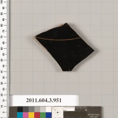 Terracotta fragment of a lekanis lid (covered dish)