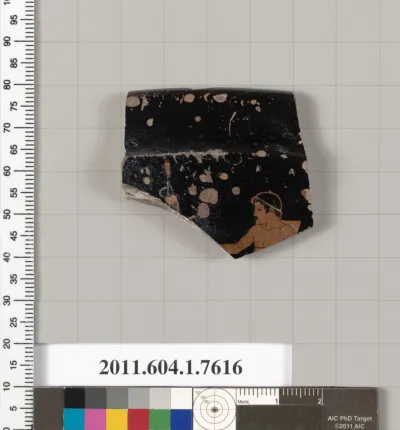 Terracotta fragment of a kylix (drinking cup)