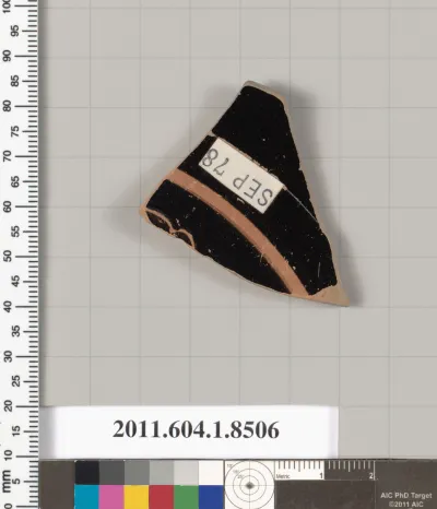 Terracotta fragment of a stemless kylix (drinking cup)