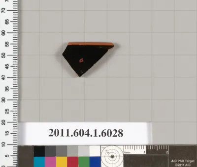 Terracotta rim fragment of a kylix (drinking cup)