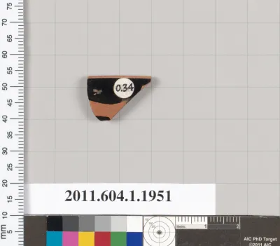 Terracotta rim fragment of a kylix (drinking cup)