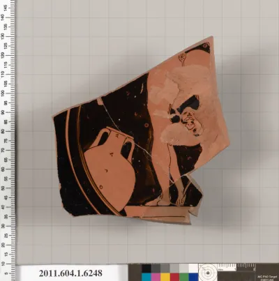 Terracotta fragment of a kylix (drinking cup)