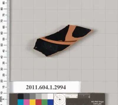 Terracotta fragment of a kylix (drinking cup)