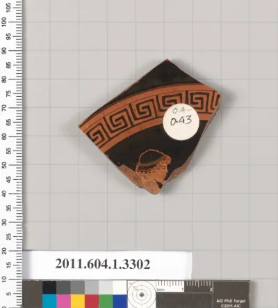 Terracotta fragment of a kylix (drinking cup)