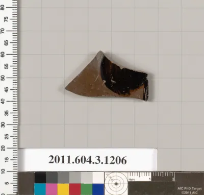 Terracotta fragment of a mastoid (drinking cup with narrow base) ?