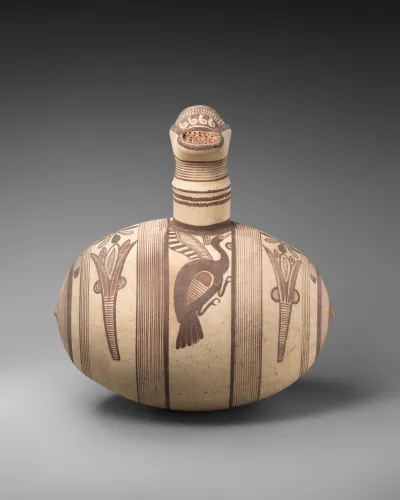 Terracotta barrel jug with strainer