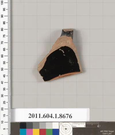 Terracotta fragment of a stemless kylix (drinking cup)