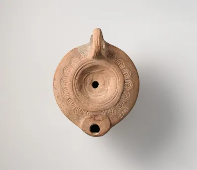 Terracotta oil lamp