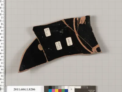 Terracotta fragment of a kylix (drinking cup)