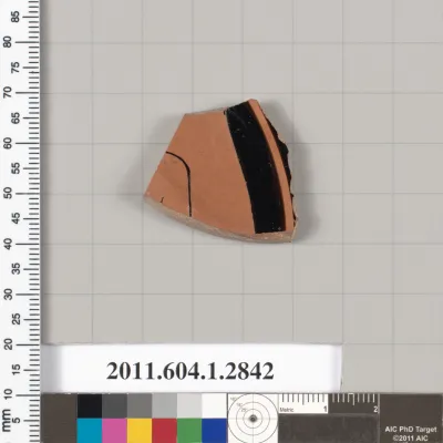 Terracotta fragment of a kylix (drinking cup)