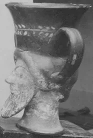 FIGURE VASE, KANTHAROS (ATHENIAN, RED-FIGURE)