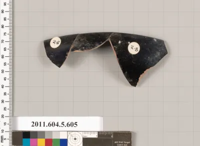 Terracotta fragment of a kylix (drinking cup)