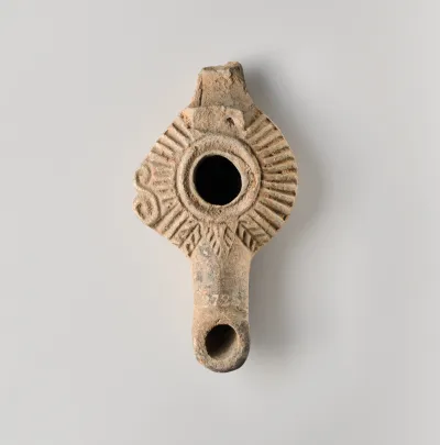Terracotta oil lamp