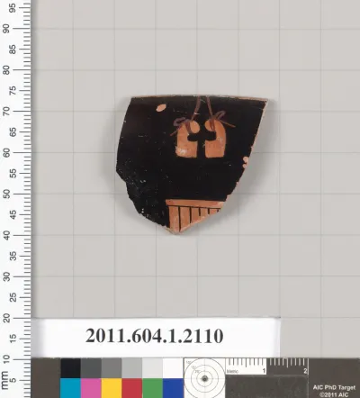 Terracotta rim fragment of a kylix (drinking cup)