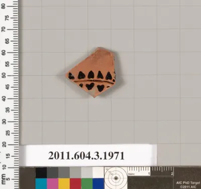 Terracotta fragment of a kylix (drinking cup)