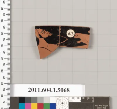 Terracotta rim fragment of a kylix (drinking cup)