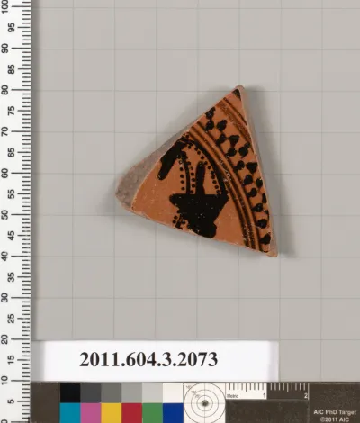 Terracotta fragment of a kylix (drinking cup)