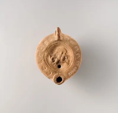 Terracotta oil lamp