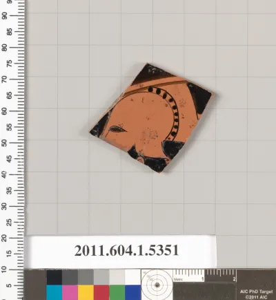 Terracotta fragment of a kylix (drinking cup)