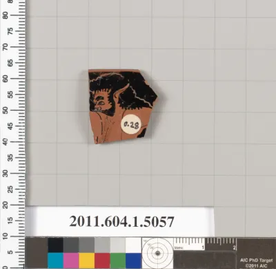 Terracotta fragment of a kylix (drinking cup)