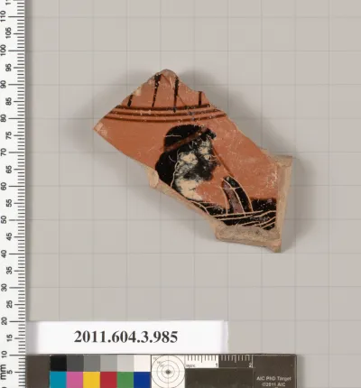 Terracotta fragment of a lekanis lid (covered dish)