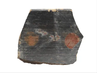 Terracotta rim of a cup with polychrome motifs