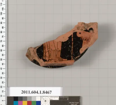 Terracotta fragment of a stemless kylix (drinking cup)
