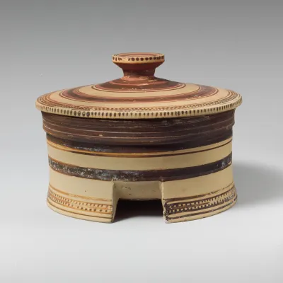 Terracotta tripod-pyxis (box)