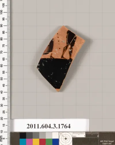 Terracotta fragment of a kylix: Band cup (drinking cup)