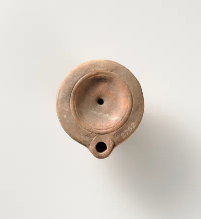 Terracotta oil lamp