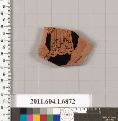 Terracotta fragment of a kylix (drinking cup)