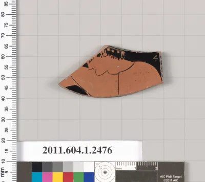 Terracotta fragment of a kylix (drinking cup)